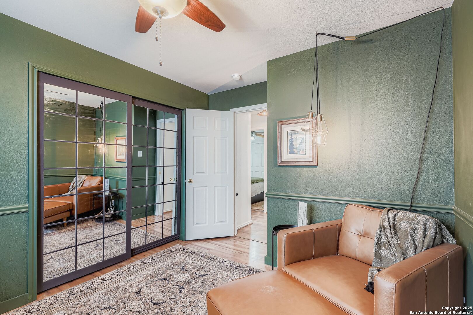 15406 Spring Dew San Antonio, TX 78247 - Photo 22 of 26 a living room with furniture and a rug