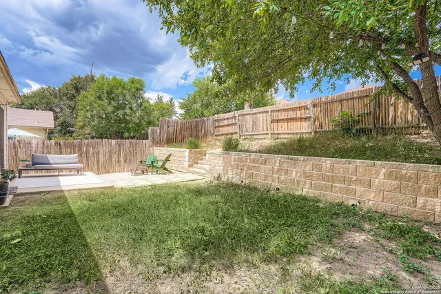 a garden view with a seating space