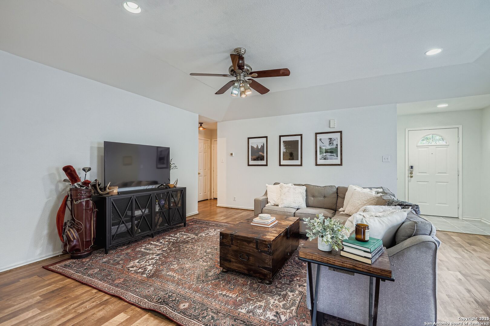 15406 Spring Dew San Antonio, TX 78247 - Photo 5 of 26 a living room with furniture and a flat screen tv