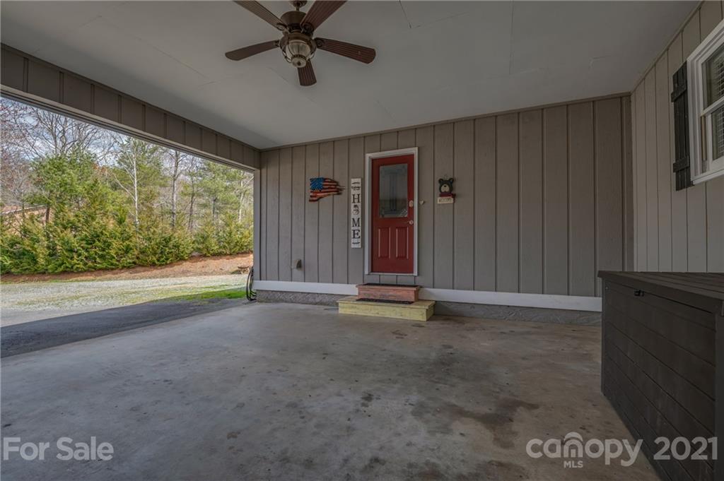 50 Owl Hollow Road Mill Spring, NC 28756 - Photo 17 of 45 a view of empty room with floor to ceiling window