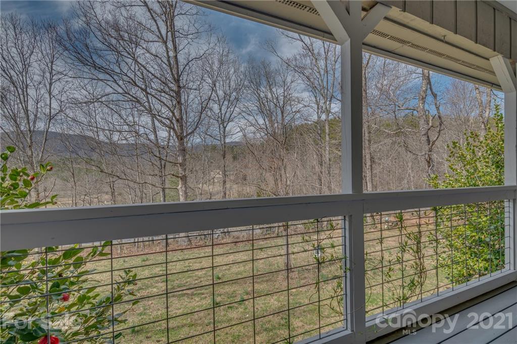 50 Owl Hollow Road Mill Spring, NC 28756 - Photo 3 of 45 a view of a room with a large window