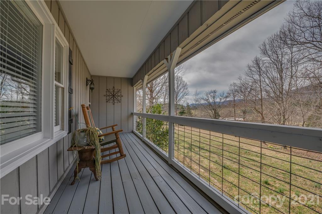 50 Owl Hollow Road Mill Spring, NC 28756 - Photo 7 of 45 a view of balcony with furniture
