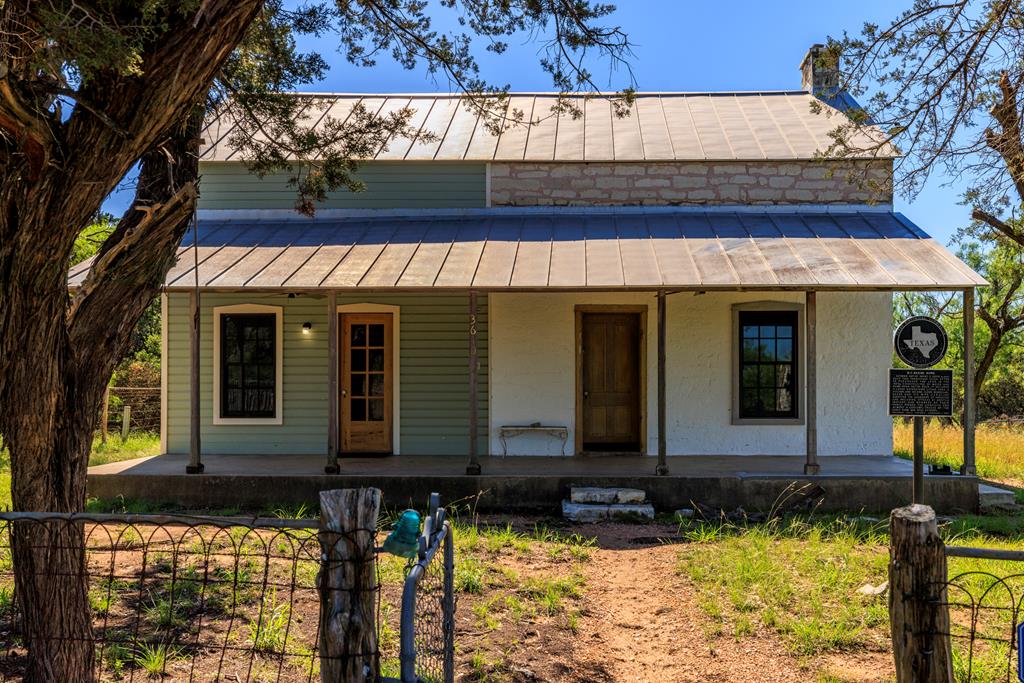 3610 Welgehausen Road Fredericksburg, TX 78624 - Photo 15 of 43 front view of a house with a yard