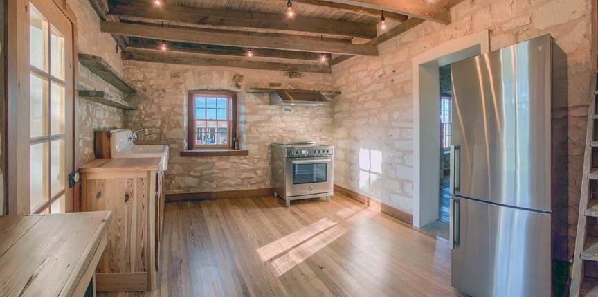 3610 Welgehausen Road Fredericksburg, TX 78624 - Photo 6 of 43 a view of a living room with a fireplace