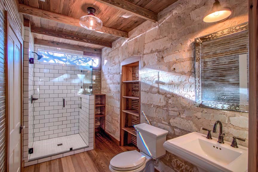 3610 Welgehausen Road Fredericksburg, TX 78624 - Photo 8 of 43 a bathroom with a sink toilet and shower