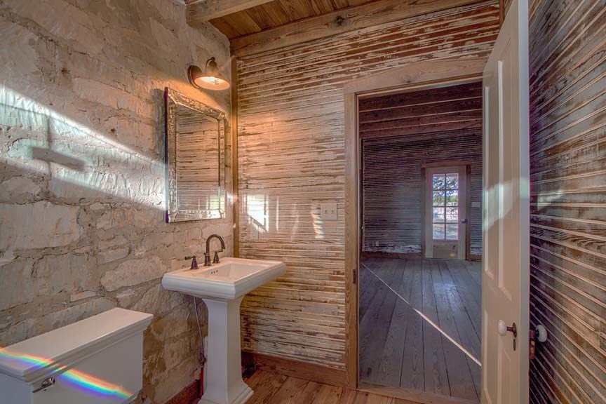 3610 Welgehausen Road Fredericksburg, TX 78624 - Photo 9 of 43 a bathroom with a sink and a mirror