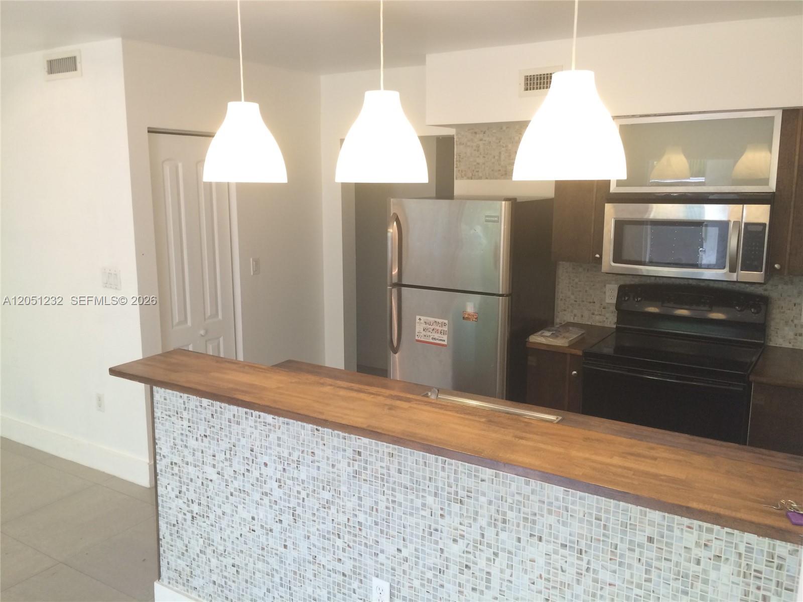 7025 Rue Granville, Unit 1 Miami Beach, FL 33141 - Photo 6 of 10 breakfast counter