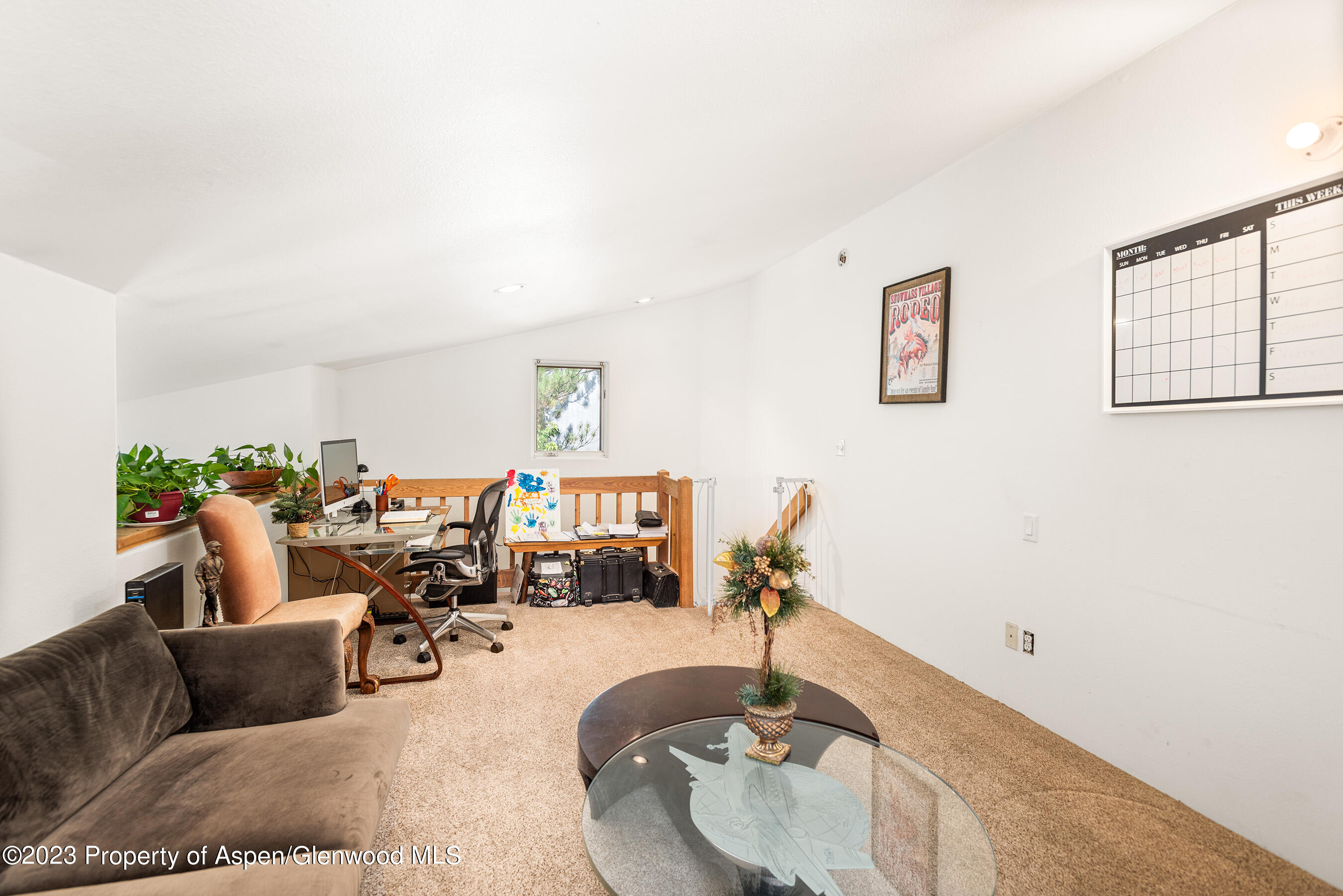 141-143 Swinging Bridge Lane Basalt, CO 81621 - Photo 11 of 35 a living room with furniture and a wooden floor