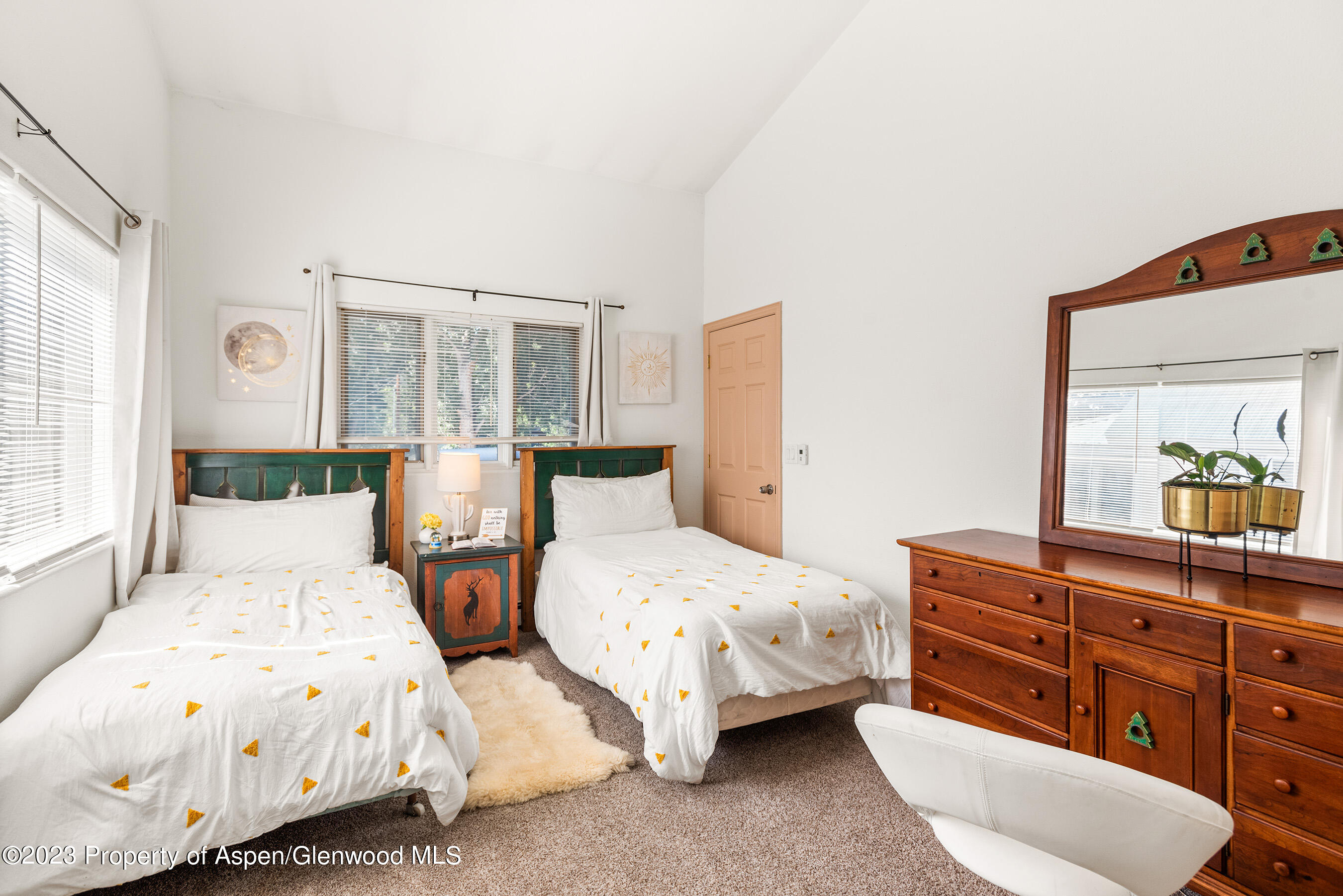 141-143 Swinging Bridge Lane Basalt, CO 81621 - Photo 15 of 35 a bedroom with two beds and a dresser