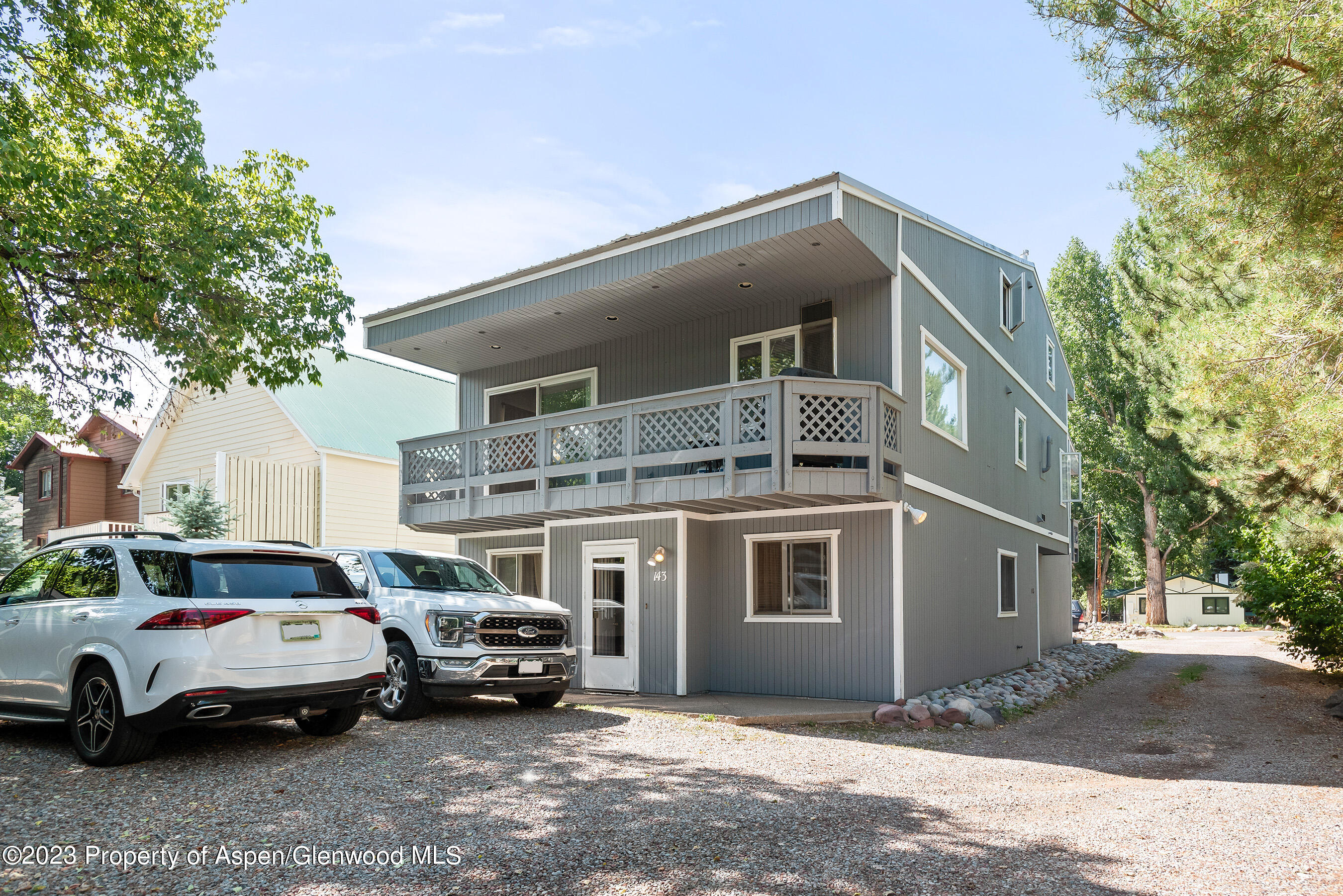 141-143 Swinging Bridge Lane Basalt, CO 81621 - Photo 17 of 35 a car parked in front of a house
