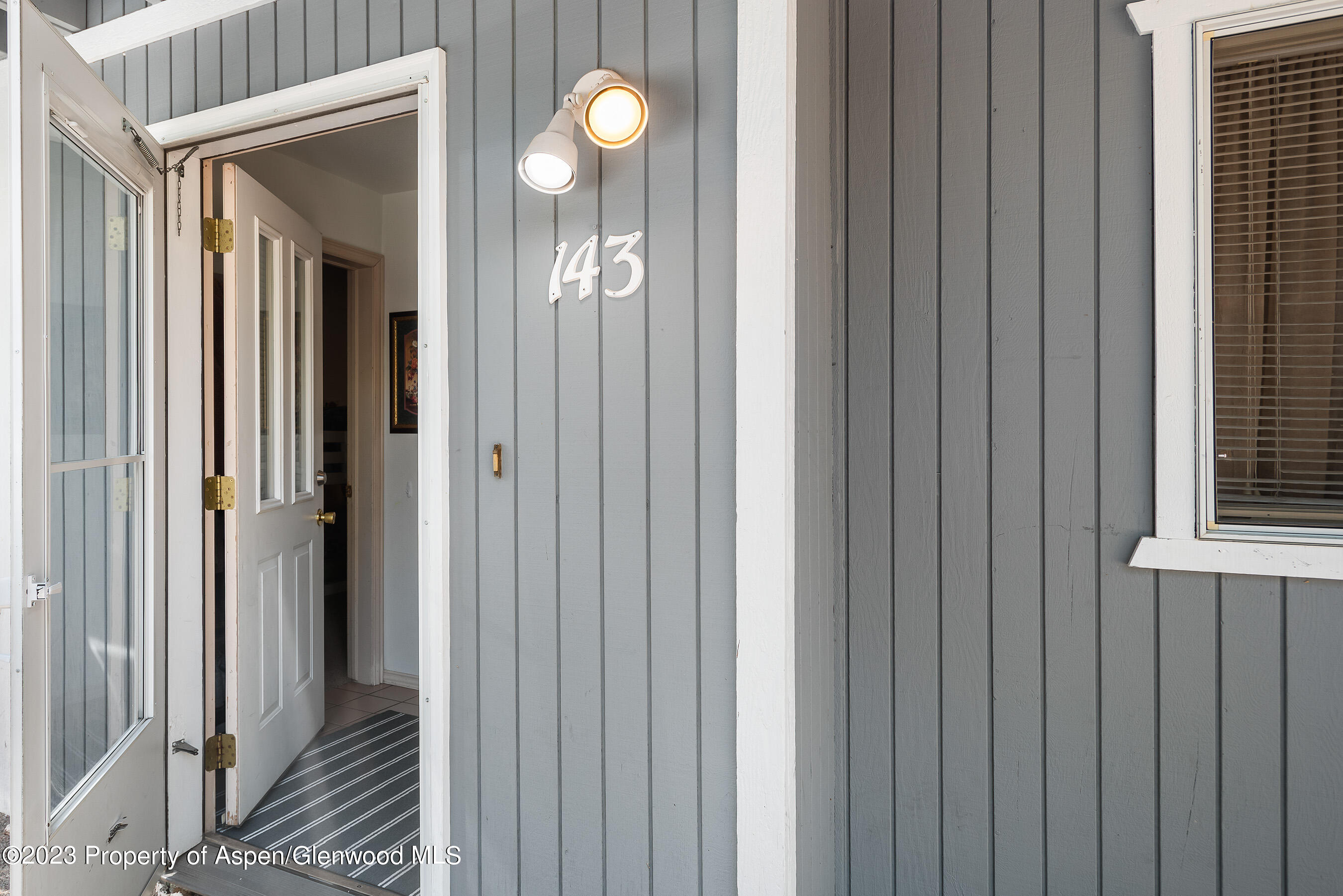 141-143 Swinging Bridge Lane Basalt, CO 81621 - Photo 18 of 35 a view of a hallway with wooden shelves