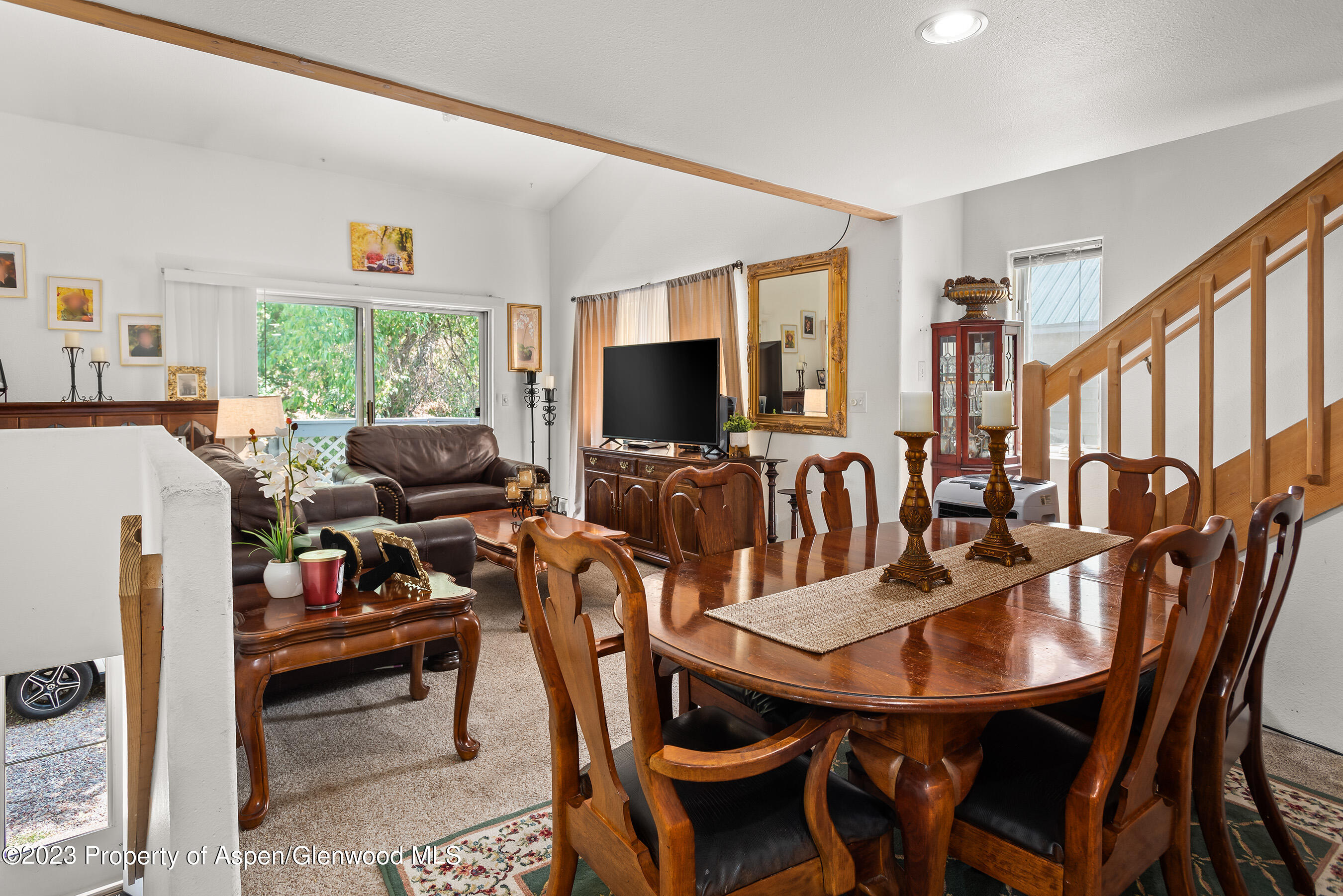 141-143 Swinging Bridge Lane Basalt, CO 81621 - Photo 21 of 35 a view of a dining room with furniture window and outside view