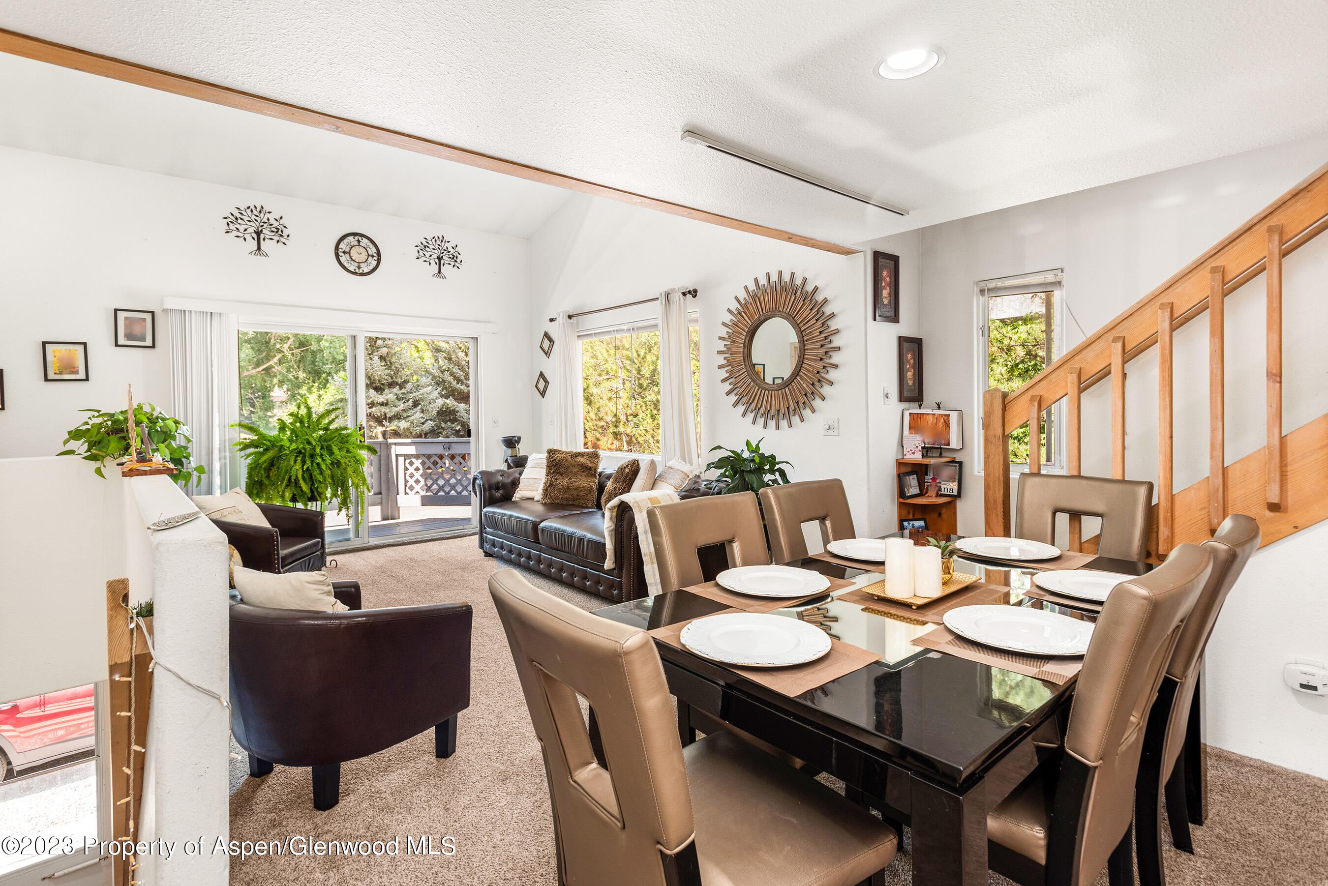 141-143 Swinging Bridge Lane Basalt, CO 81621 - Photo 5 of 35 a living room with furniture and a large window