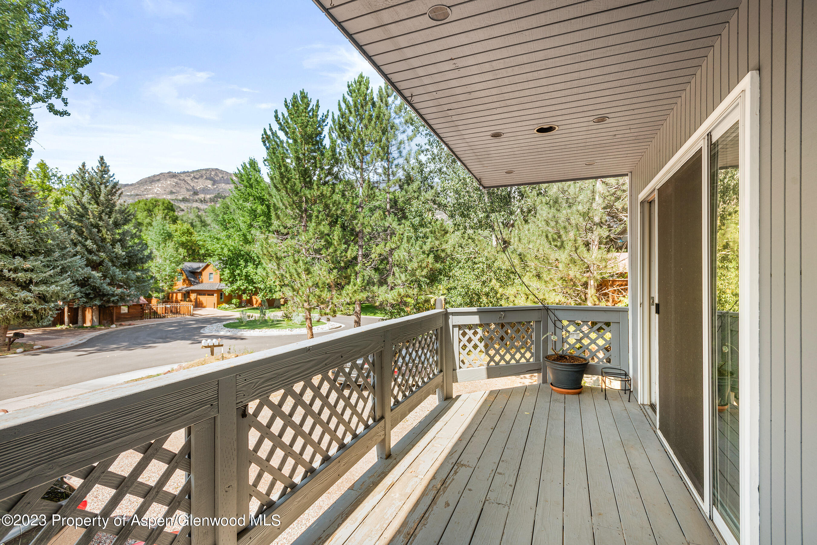 141-143 Swinging Bridge Lane Basalt, CO 81621 - Photo 8 of 35 a view of balcony with wooden floor and seating space