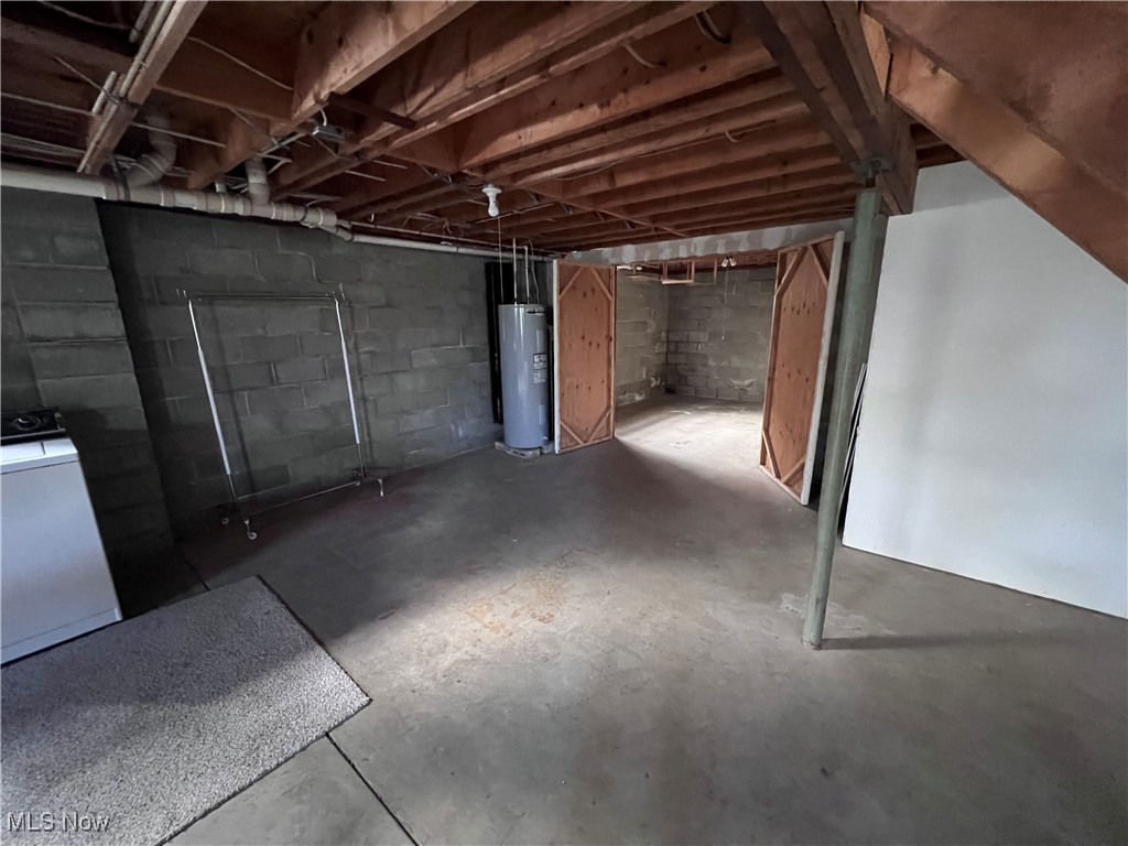 56376 Jordan Run Road Bellaire, OH 43906 - Photo 29 of 45 Basement featuring washer / dryer and water heater