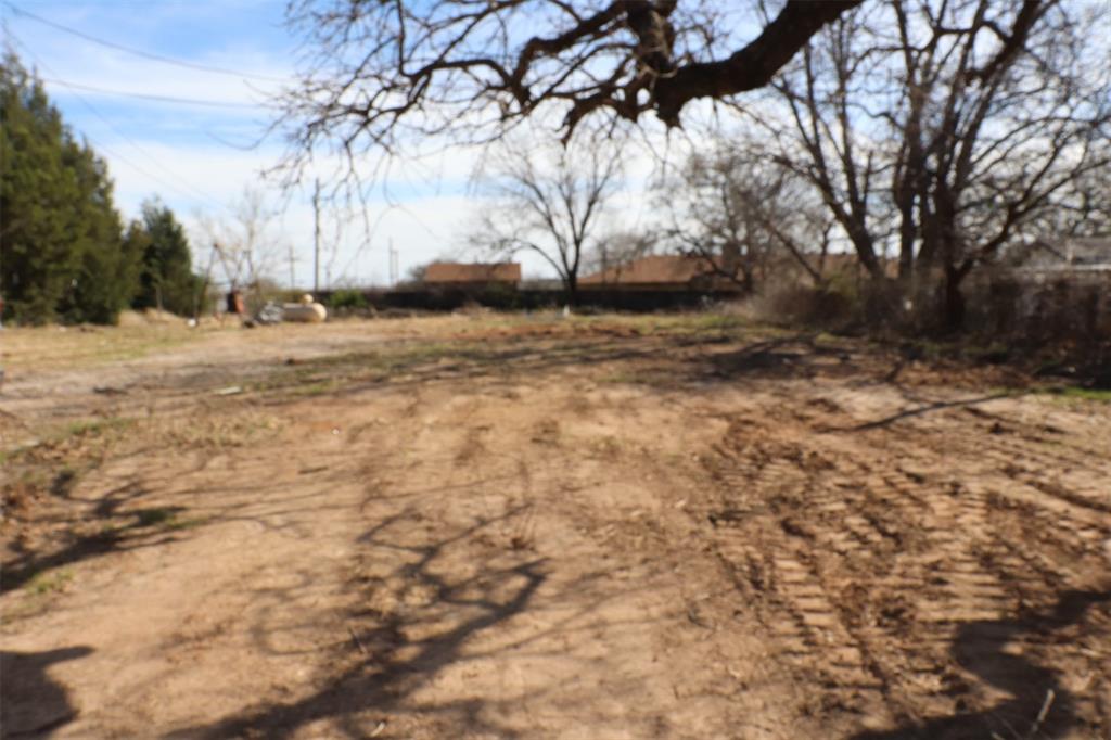 1616 Oliver Street Weatherford, TX 76086 - Photo 12 of 15 a view of yard covered with snow in outdoor space