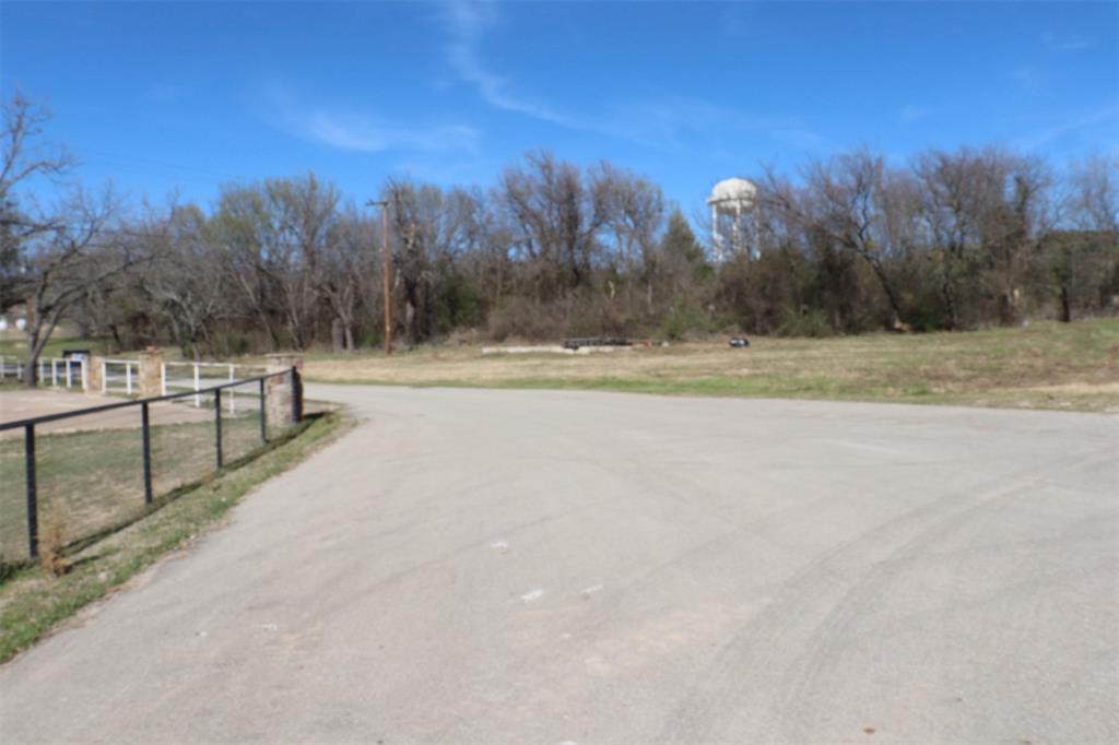 1616 Oliver Street Weatherford, TX 76086 - Photo 2 of 15 a view of a terrace with trees