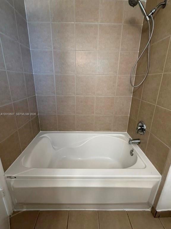 1712 Southwest 2nd Avenue, Unit 304 Miami, FL 33129 - Photo 13 of 18 a bathroom with a bath tub