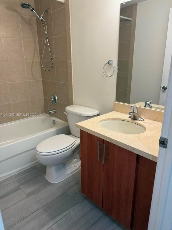 1712 Southwest 2nd Avenue, Unit 304 Miami, FL 33129 - Photo 16 of 18 a bathroom with a sink a toilet and shower