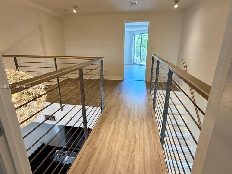 1712 Southwest 2nd Avenue, Unit 304 Miami, FL 33129 - Photo 8 of 18 a view of entryway with wooden floor