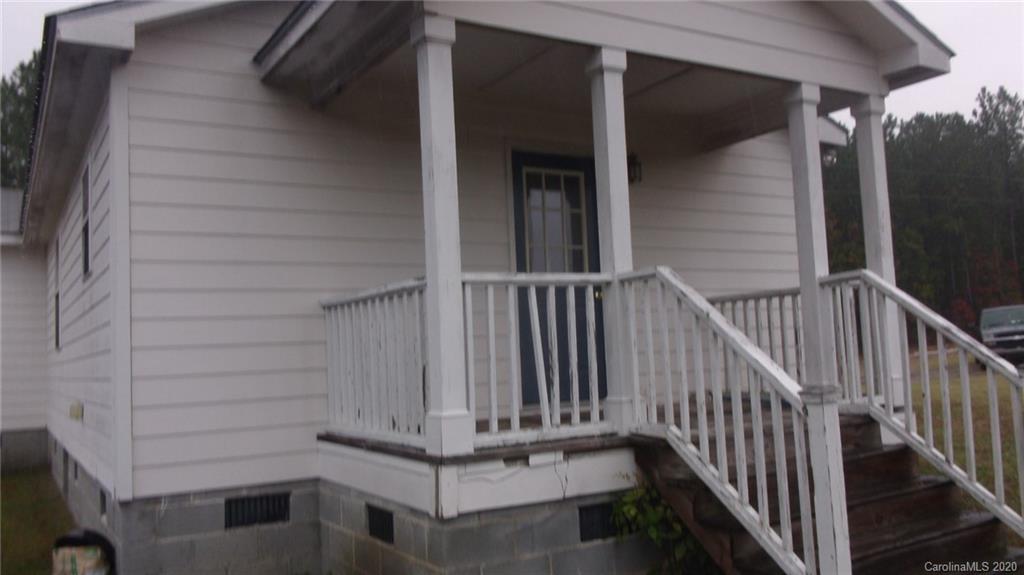 336 Landfill Road Jefferson, SC 29718 - Photo 3 of 9 a view of a porch of a house