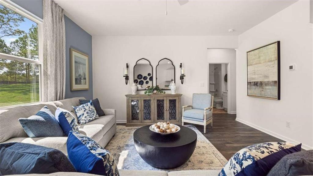 476 Bullock Pass Jefferson, GA 30549 - Photo 20 of 66 a living room with furniture and a large window