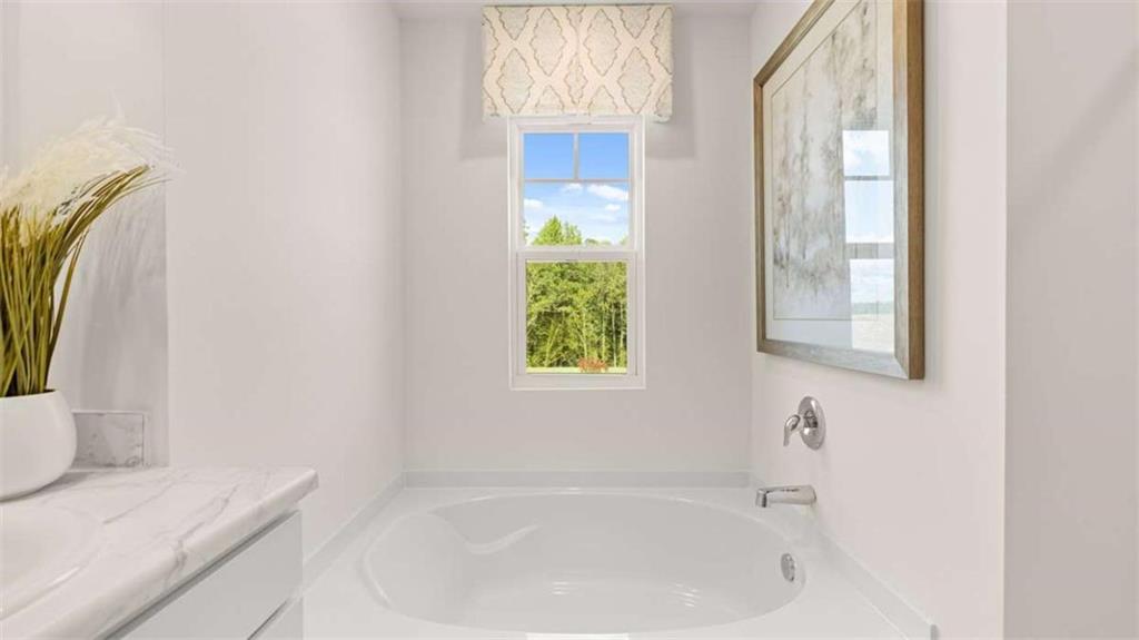 476 Bullock Pass Jefferson, GA 30549 - Photo 35 of 66 a white bath tub sitting next to a window