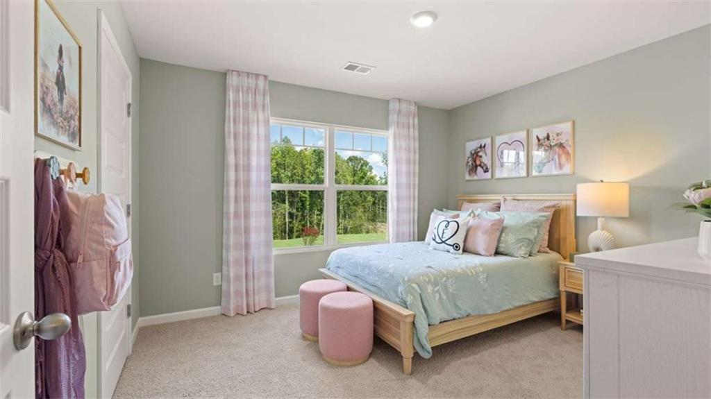 476 Bullock Pass Jefferson, GA 30549 - Photo 43 of 66 a bedroom with a bed lamp and a large window