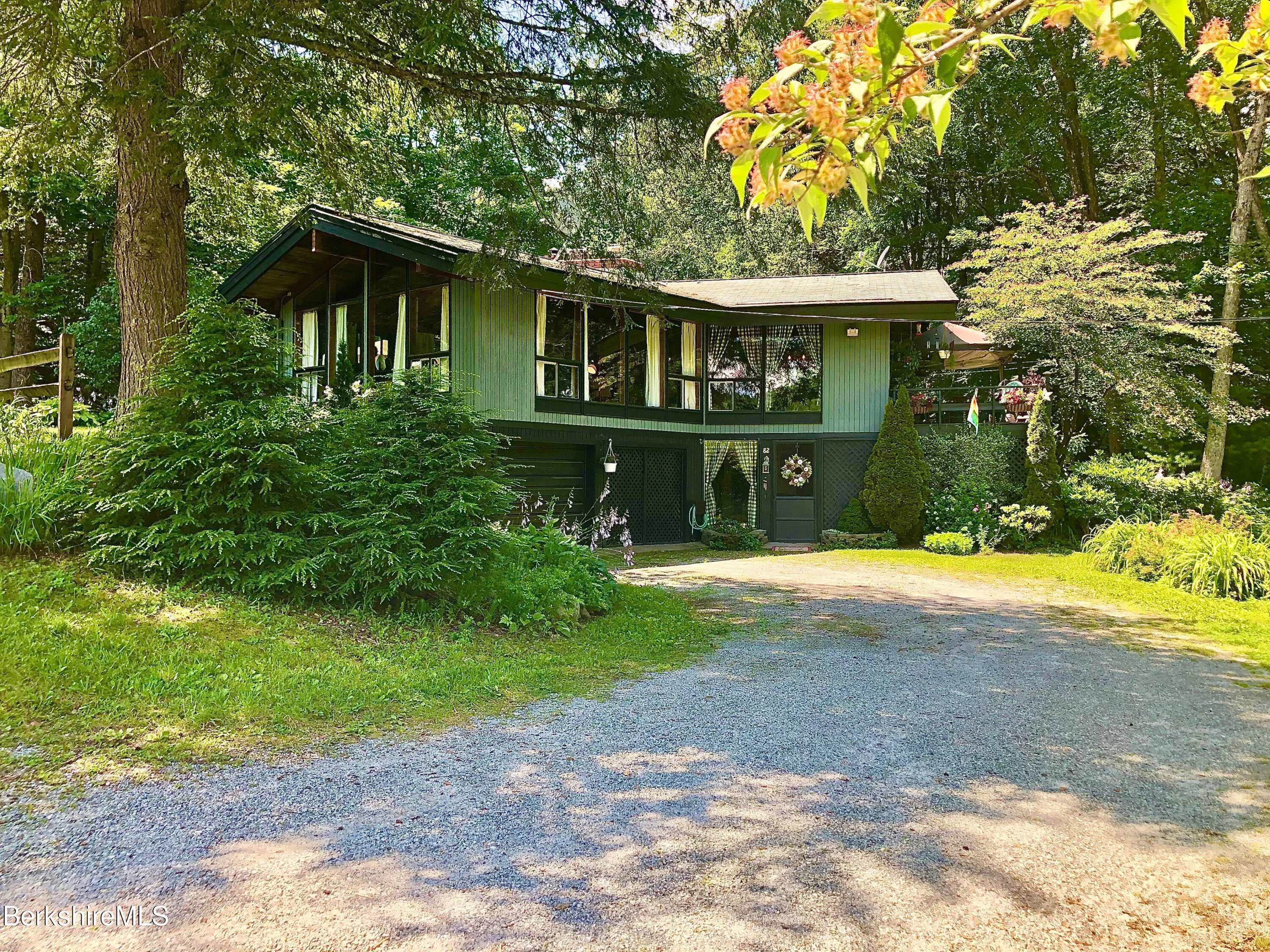 82 Beaver Hill Road Otis, MA 01253 - Photo 4 of 49 a front view of house with yard and green space