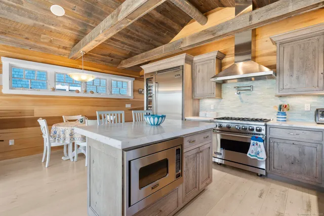 a kitchen with a stove and a sink