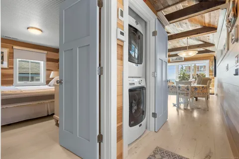 a view of a living room and entry way to rooms