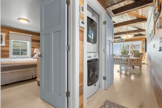 a view of a living room and entry way to rooms