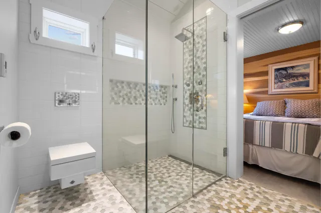 a bedroom with a bed and dresser