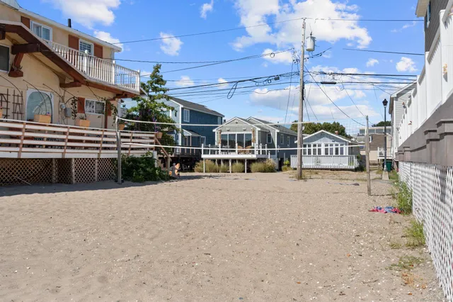 a multi story building with an outdoor space