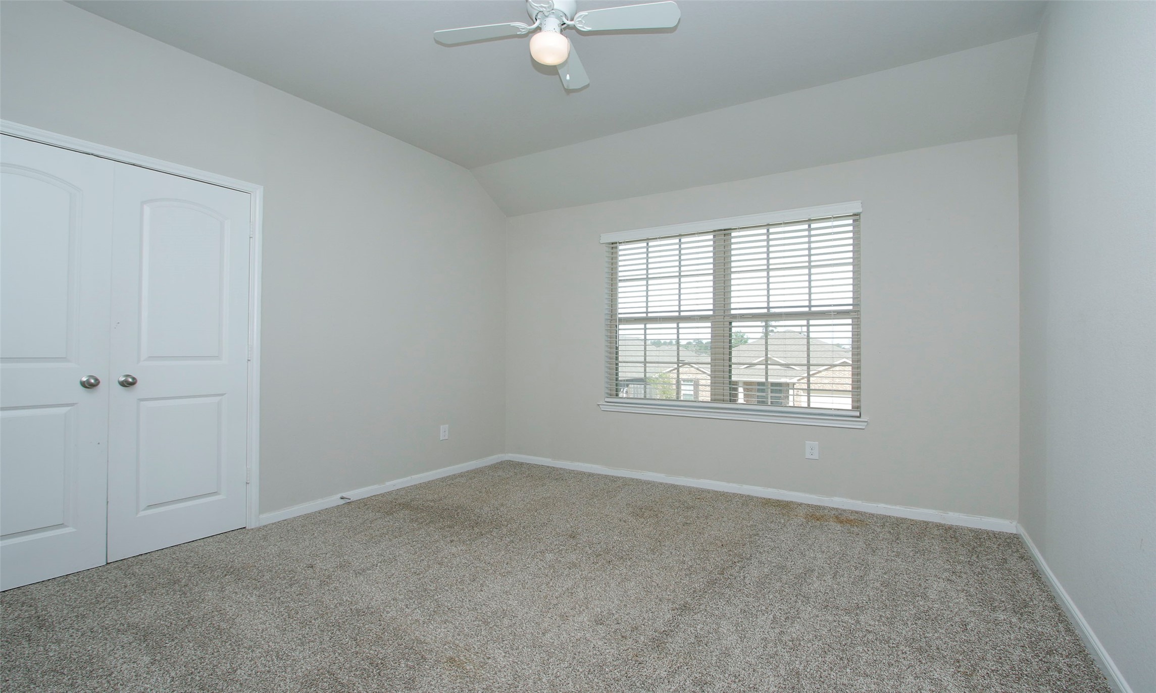 14120 Sand Ridge Court Conroe, TX 77384 - Photo 35 of 43 an empty room with a window
