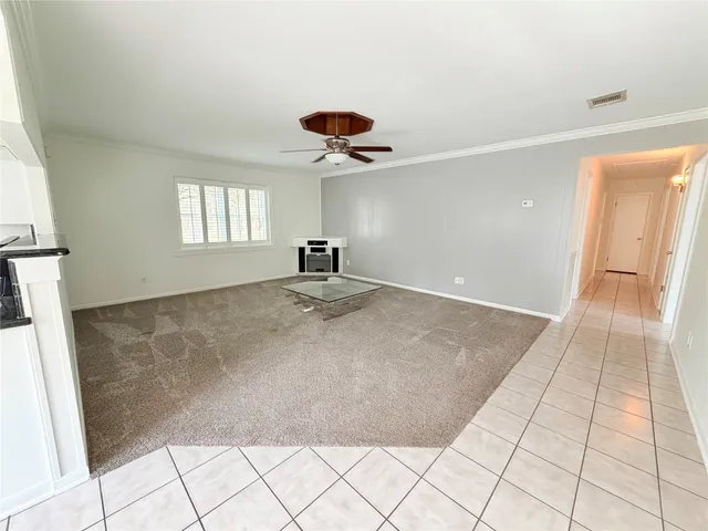 a view of an empty room and window