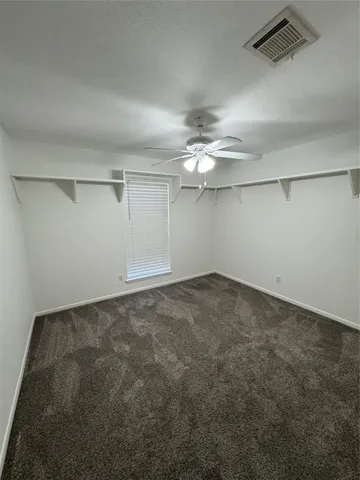 a view of a room with an empty space