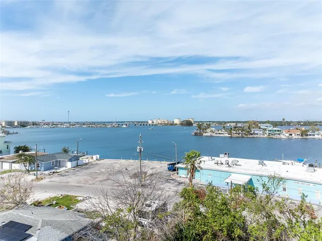 a view of a lake with a yard