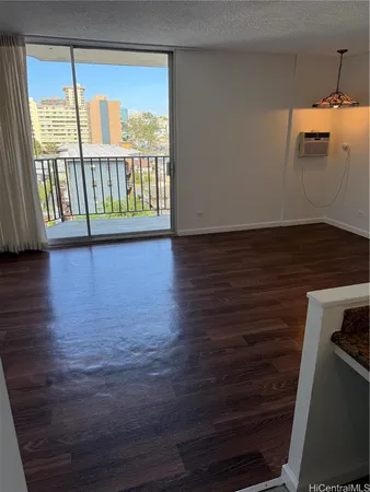 a view of a kitchen from the hallway