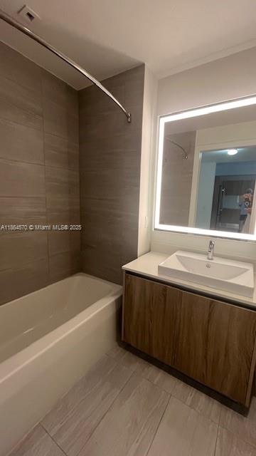 2960 Northeast 207th Street, Unit 607 Aventura, FL 33180 - Photo 7 of 11 a bathroom with a bathtub and a shower