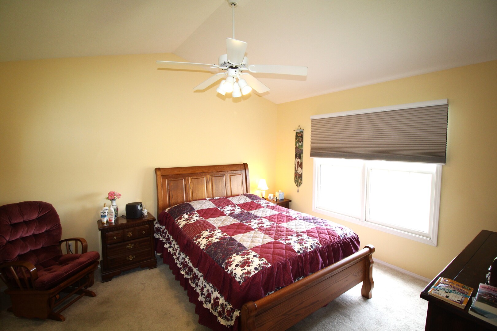 25 Oak Park Road Bloomington, IL 61701 - Photo 12 of 28 a bed sitting in a bedroom next to a window