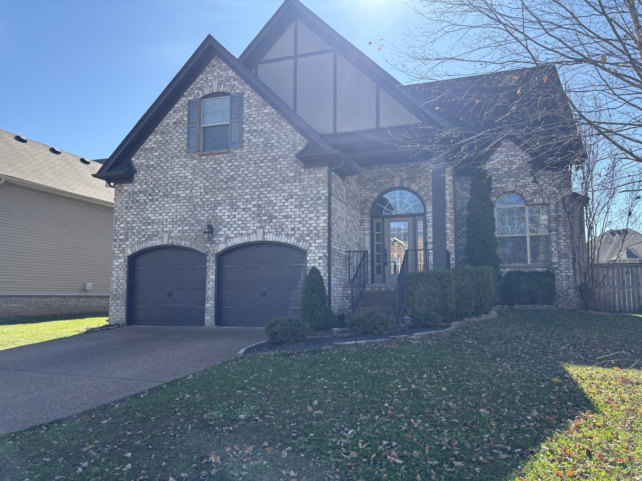 1073 Golf View Way Spring Hill, TN 37174 - Photo 1 of 12 a front view of a house with a yard