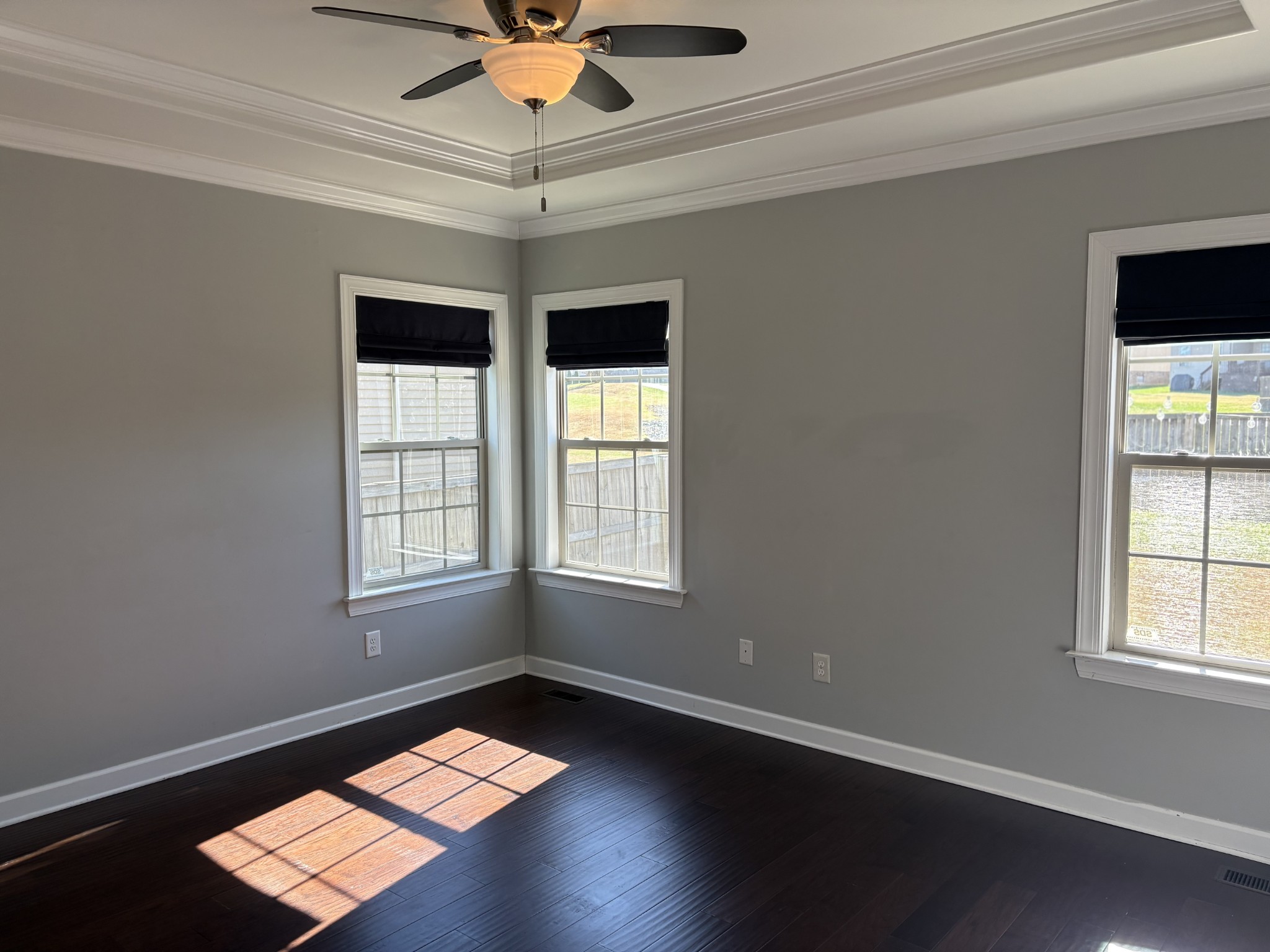 1073 Golf View Way Spring Hill, TN 37174 - Photo 5 of 12 a view of an empty room with a window and wooden floor