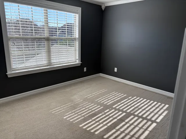 a view of a room with a window