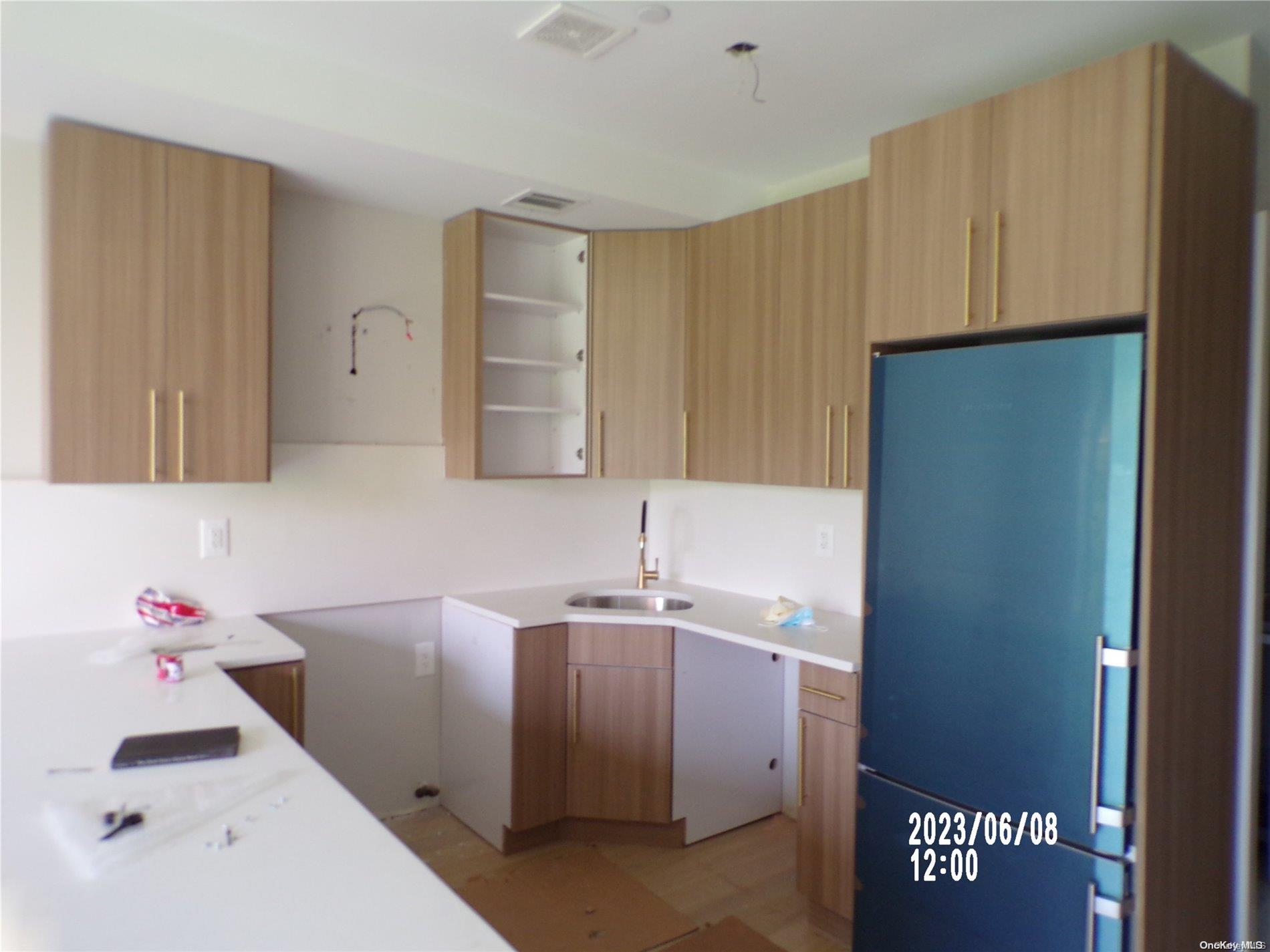 695 Monroe Street Brooklyn, NY 11221 - Photo 5 of 23 a bathroom with a sink toilet and a mirror