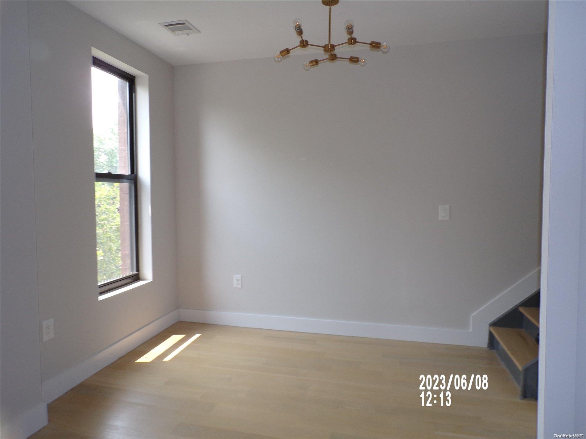 695 Monroe Street Brooklyn, NY 11221 - Photo 10 of 23 an empty room with windows