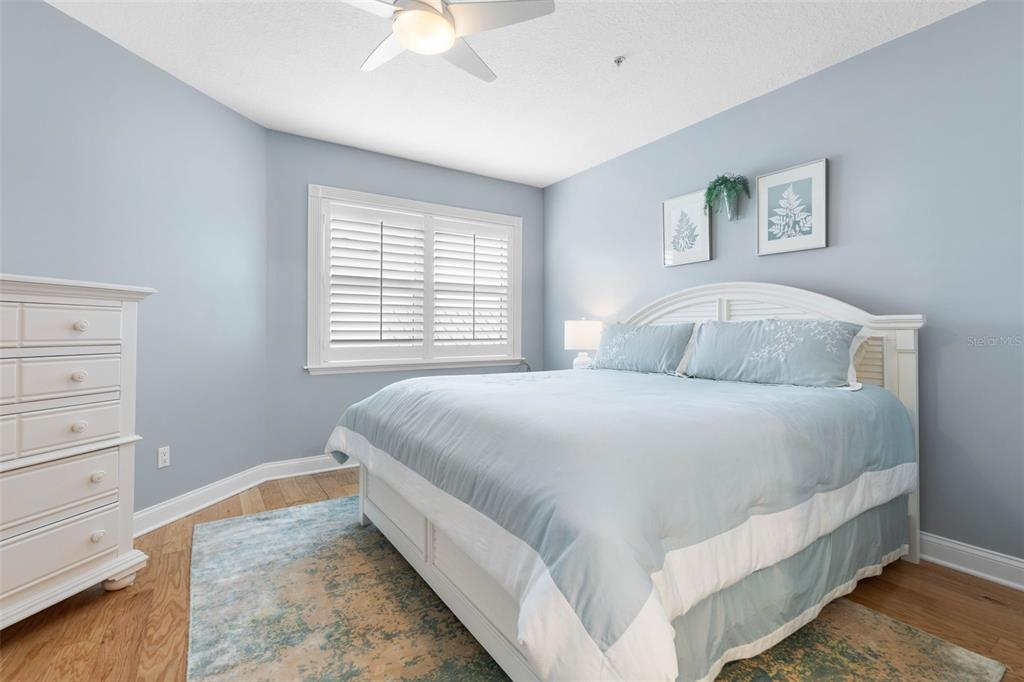 4642 Riverwalk Village Court Ponce Inlet, FL 32127 - Photo 46 of 98 a bedroom with a bed and a window