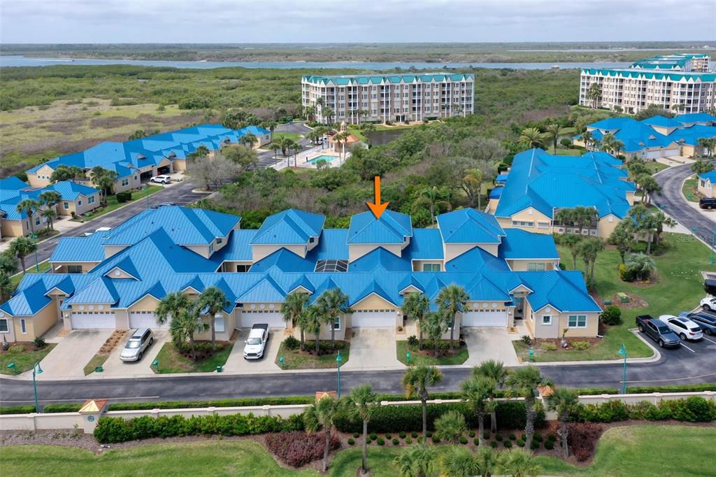 4642 Riverwalk Village Court Ponce Inlet, FL 32127 - Photo 64 of 98 an aerial view of residential houses with outdoor space and swimming pool