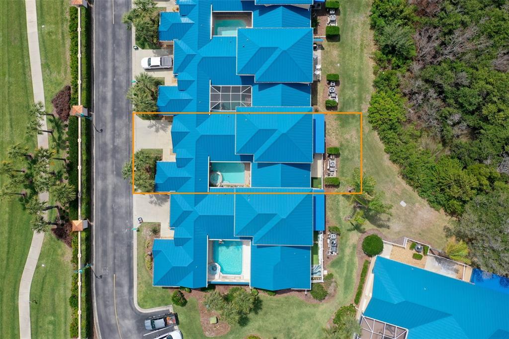 4642 Riverwalk Village Court Ponce Inlet, FL 32127 - Photo 70 of 98 aerial view of a house with a yard