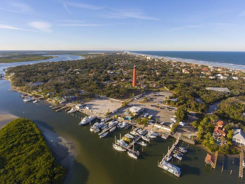 4642 Riverwalk Village Court Ponce Inlet, FL 32127 - Photo 98 of 98 an aerial view of residential building with ocean view